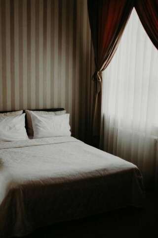 Отель Bordo Business House Херсон Стандартный двухместный номер с 1 кроватью или 2 отдельными кроватями-10